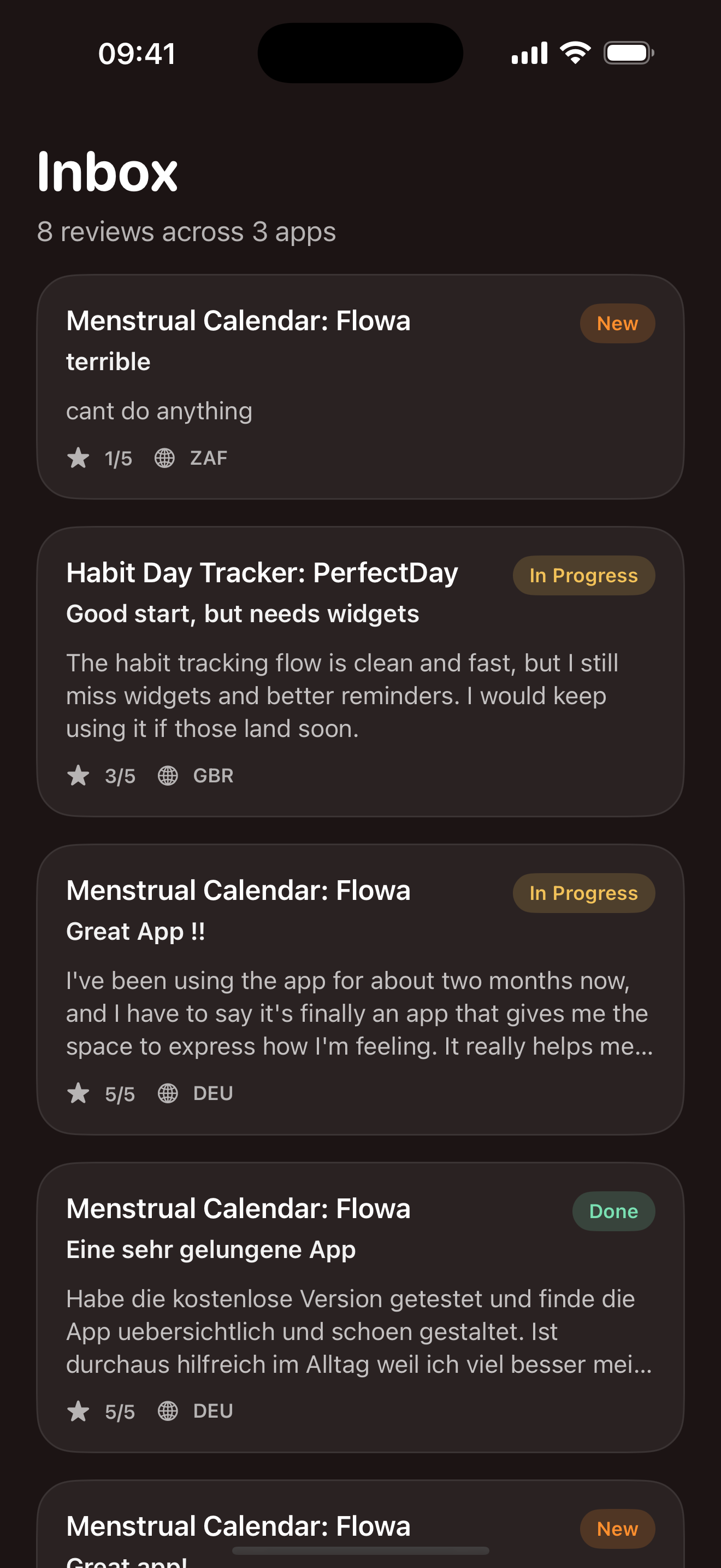 Store Reviews inbox screen showing customer reviews across apps with status badges, ratings, territories, and review dates.